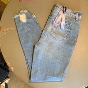 High waisted distressed jeans
